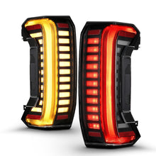 Load image into Gallery viewer, ANZO 311454X Full LED Tail Lights with Black Housing and Clear Lens for Toyota Tundra 2022-2024, featuring initiation and sequential lighting.