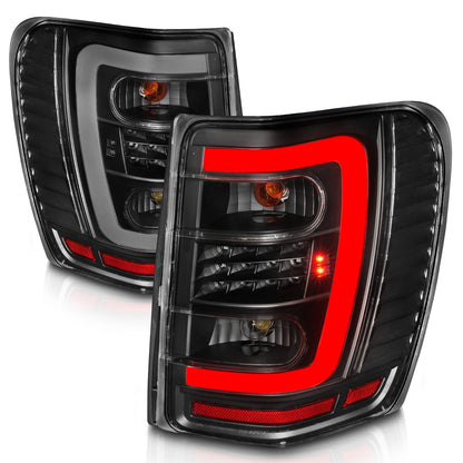 ANZO 311394 LED C-Bar Tail Lights with Black Housing and Clear Lens for Jeep Grand Cherokee (1999-2004).