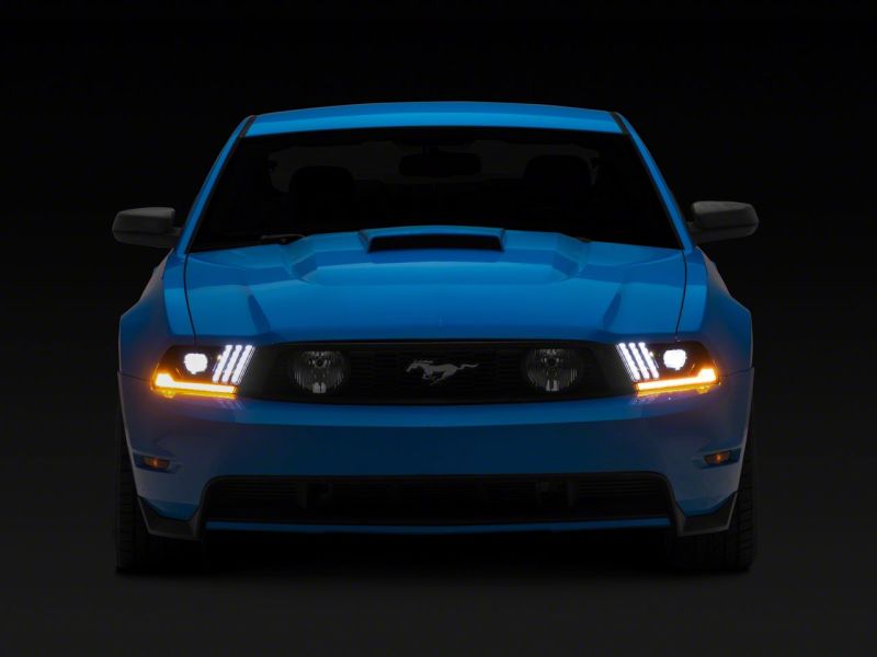 Raxiom 10-12 Ford Mustang LED Projector Headlights SEQL Turn Signals- Blk Housing (Clear Lens)