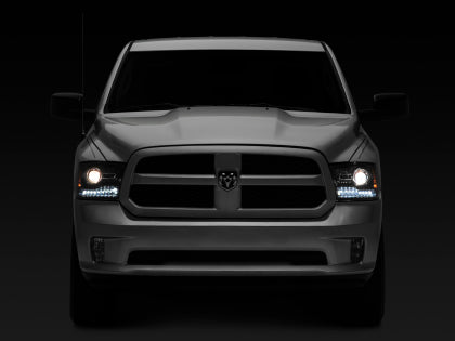 Raxiom 09-18 Dodge RAM 1500 LED Halo Headlights w/Switchback Turn Signals- Blk Housing (Clear Lens)