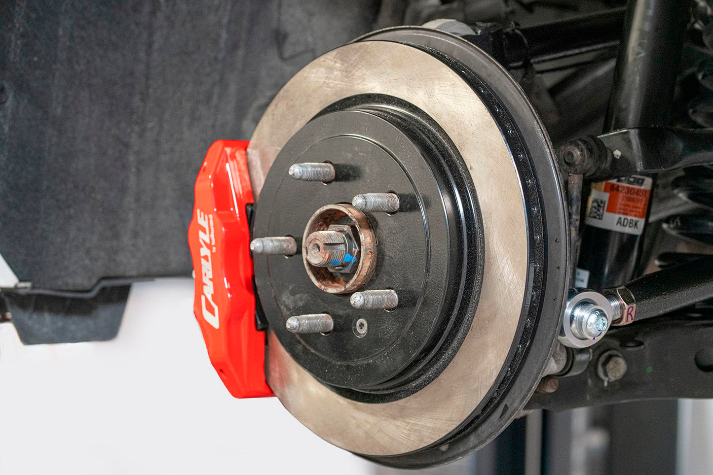 BMR DBK351 15 inch conversion brake kit with solid rotors and red calipers Camaro CTS-V G8 SS