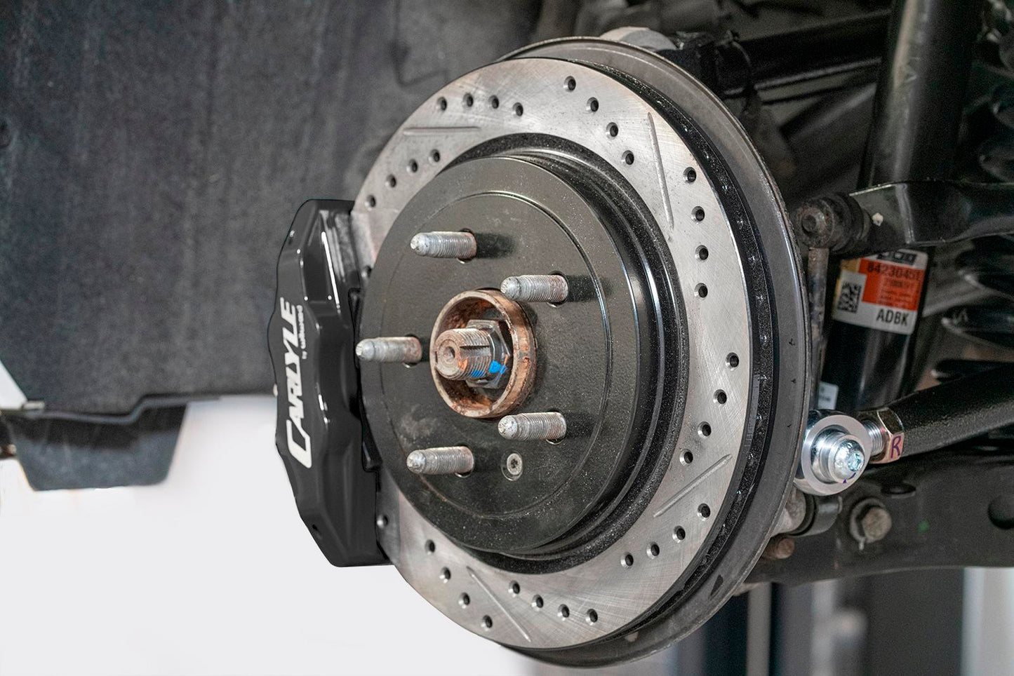 BMR DBK352 15 inch conversion brake kit with drilled slotted rotors and black calipers Camaro CTS-V G8 SS