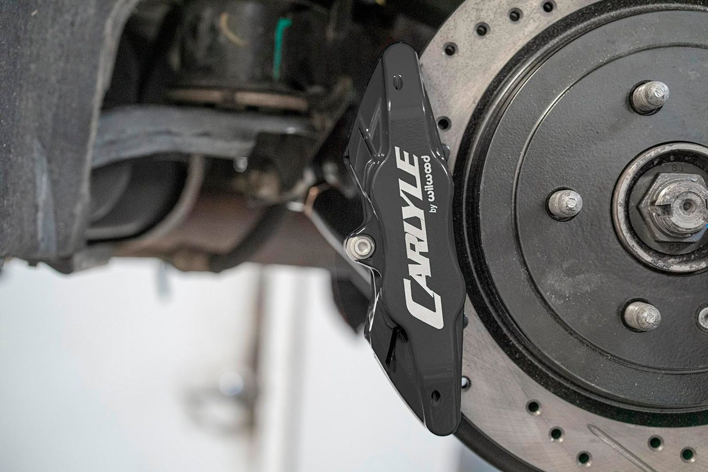BMR DBK352 15 inch conversion brake kit with drilled slotted rotors and black calipers Camaro CTS-V G8 SS