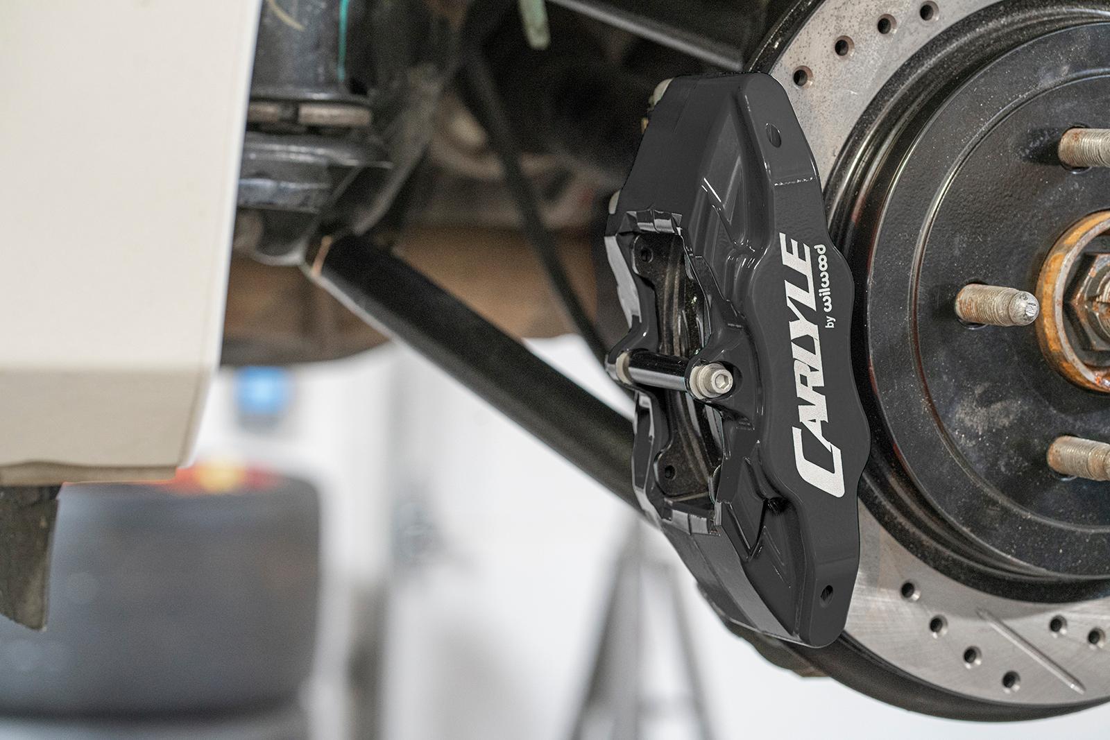 BMR DBK352 15 inch conversion brake kit with drilled slotted rotors and black calipers Camaro CTS-V G8 SS