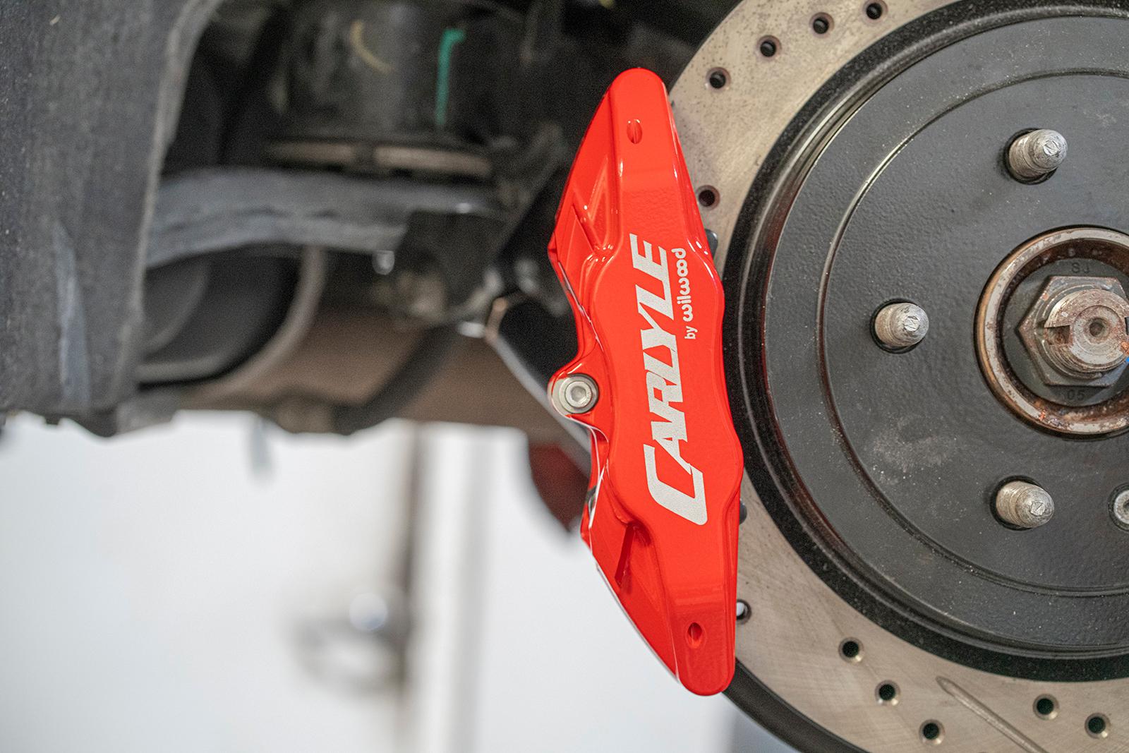 BMR DBK353 15 inch conversion brake kit with drilled slotted rotors and red calipers Camaro CTS-V G8 SS