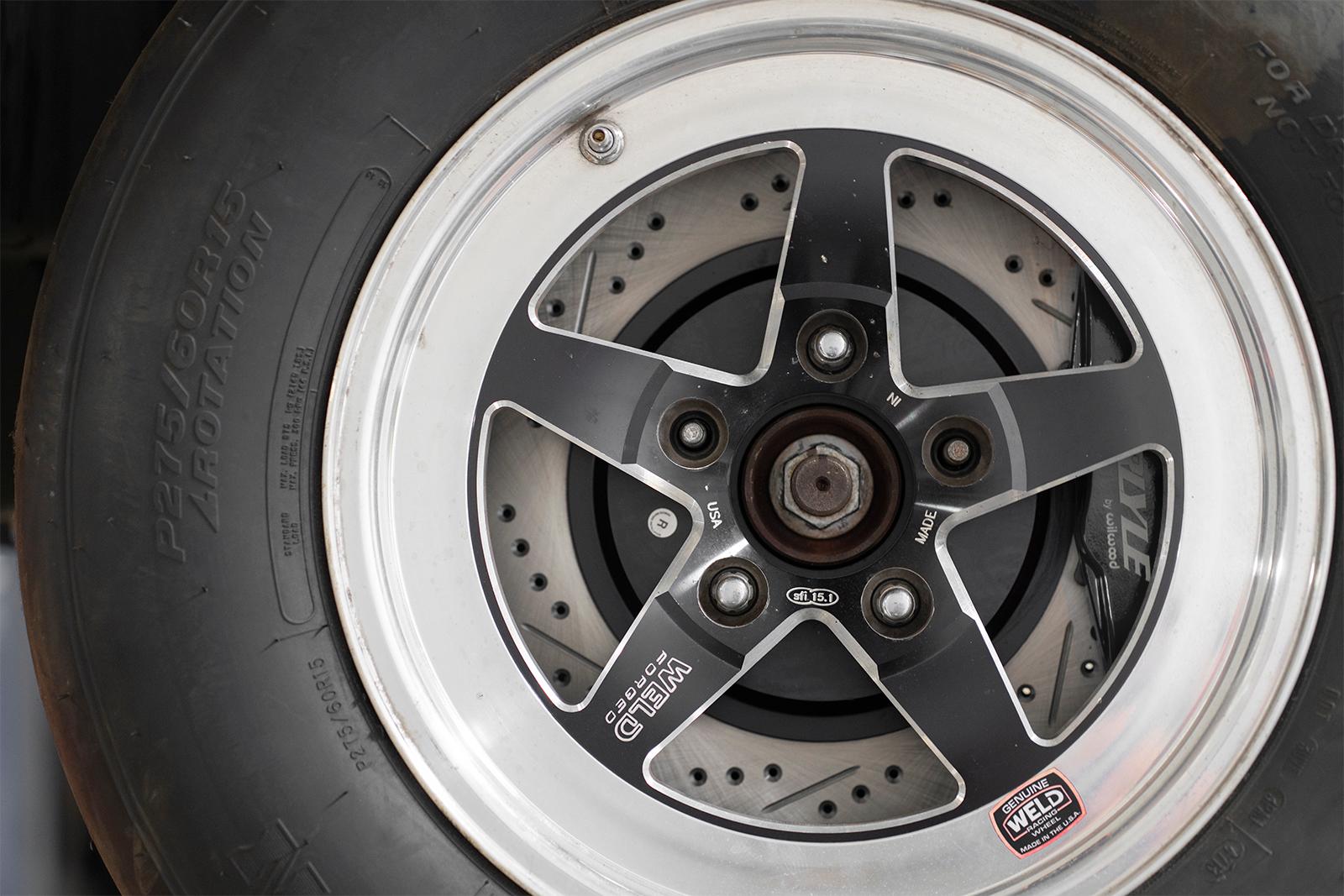 BMR DBK552 15 inch conversion brake kit with drilled slotted rotors and Wilwood calipers Corvette C5 C6 installed with drag tire