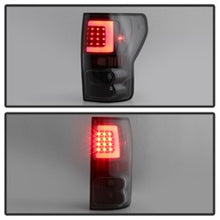 Load image into Gallery viewer, xTune 07-13 Toyota Tundra Light Bar LED Tail lights - Black (ALT-ON-TTU07V2-LBLED-BK)