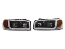 Load image into Gallery viewer, Raxiom 99-06 GMC Sierra 1500 Axial Series Headlights w/ LED Bar- Blk Housing (Clear Lens)