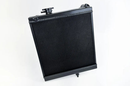 CSF 7228B black all-aluminum half radiator for Mitsubishi Lancer Evolution VIII and IX