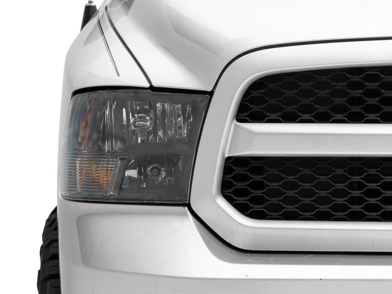 Raxiom 09-18 Dodge RAM 1500 Axial Series Euro Style Headlights w/ Dual Bulb Blk Housing (Clear Lens)