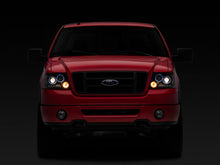 Load image into Gallery viewer, Raxiom 04-08 Ford F-150 Dual LED Halo Projector Headlights- Black Housing (Clear Lens)