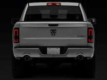 Load image into Gallery viewer, Raxiom 09-18 Dodge RAM 1500/2500/3500 Axial Series LED Tail Lights- Blk Housing (Smoked Lens)