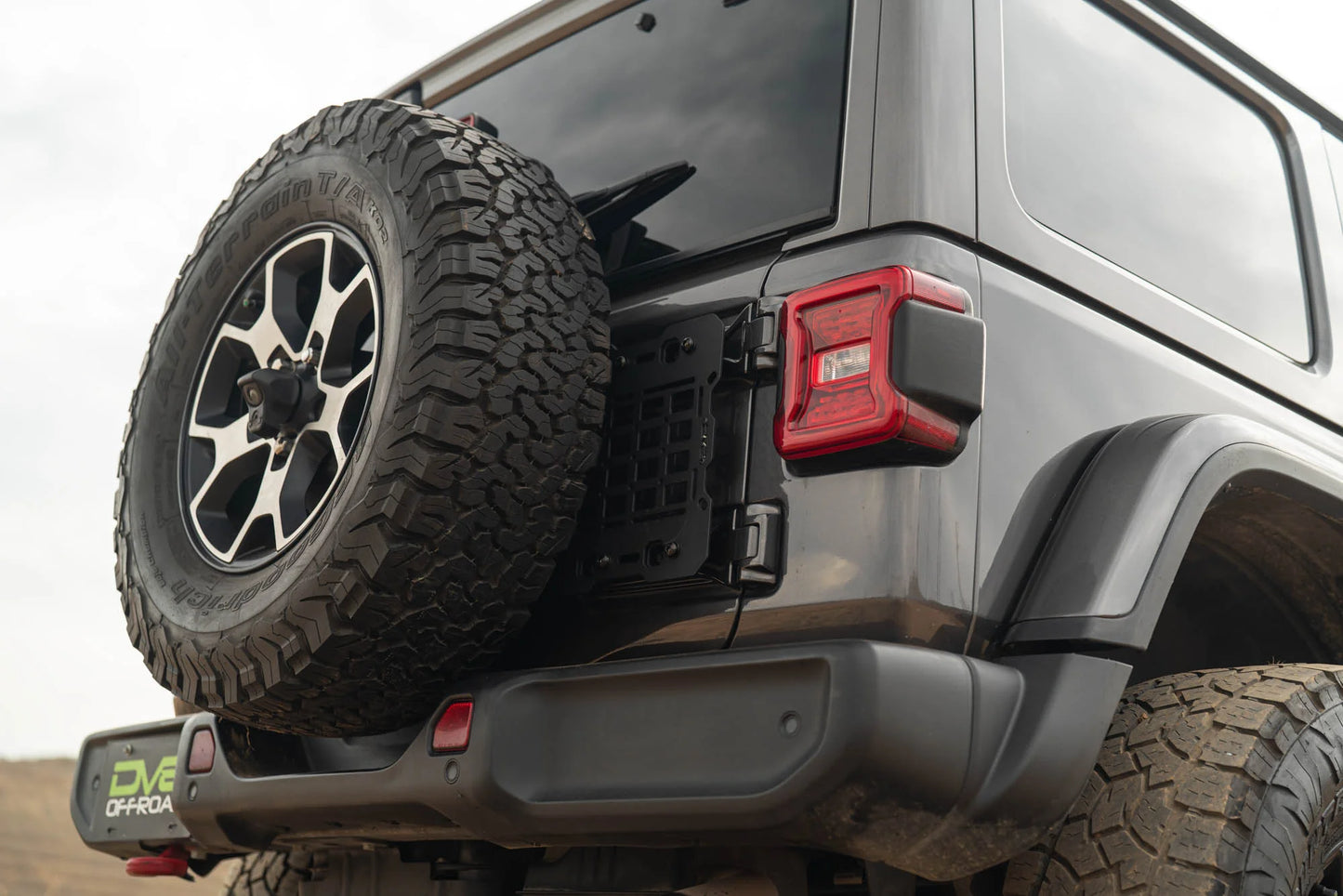 DV8 Offroad spare tire carrier reinforcement for 2018-2025 Jeep Wrangler JL with MOLLE panel