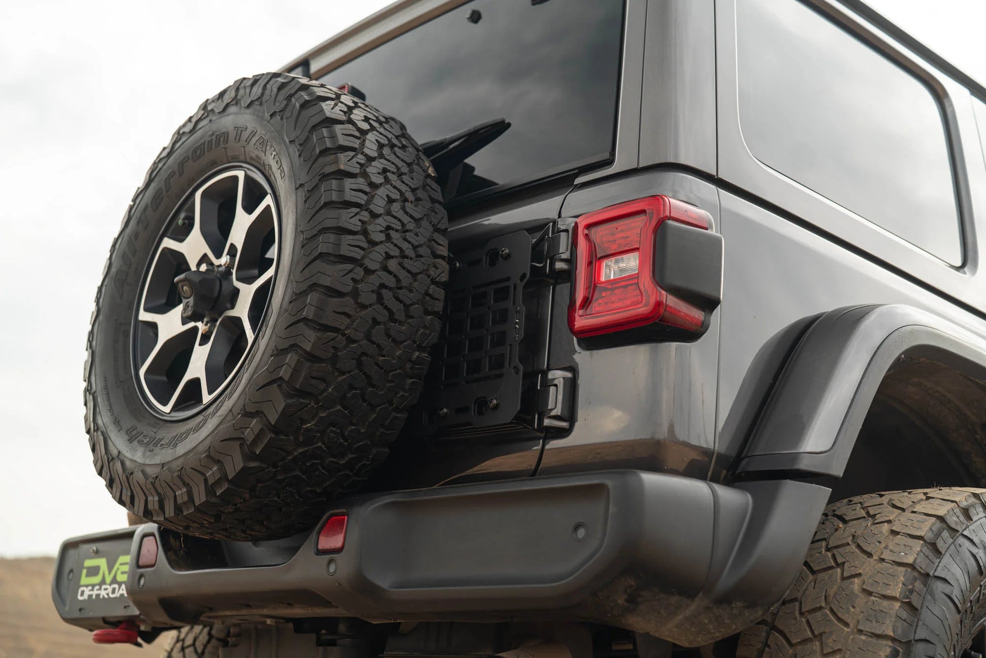 DV8 Offroad spare tire carrier reinforcement for 2018-2025 Jeep Wrangler JL with MOLLE panel