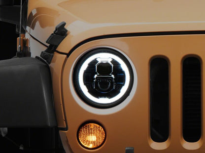 Raxiom 07-18 Jeep Warngler Axial Series 7-Inch LED Headlights w DRL/ Black Housing - Clear Lens