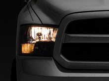 Load image into Gallery viewer, Raxiom 09-18 Dodge RAM 1500 Axial Series Euro Style Headlights w/ Dual Bulb Blk Housing (Clear Lens)