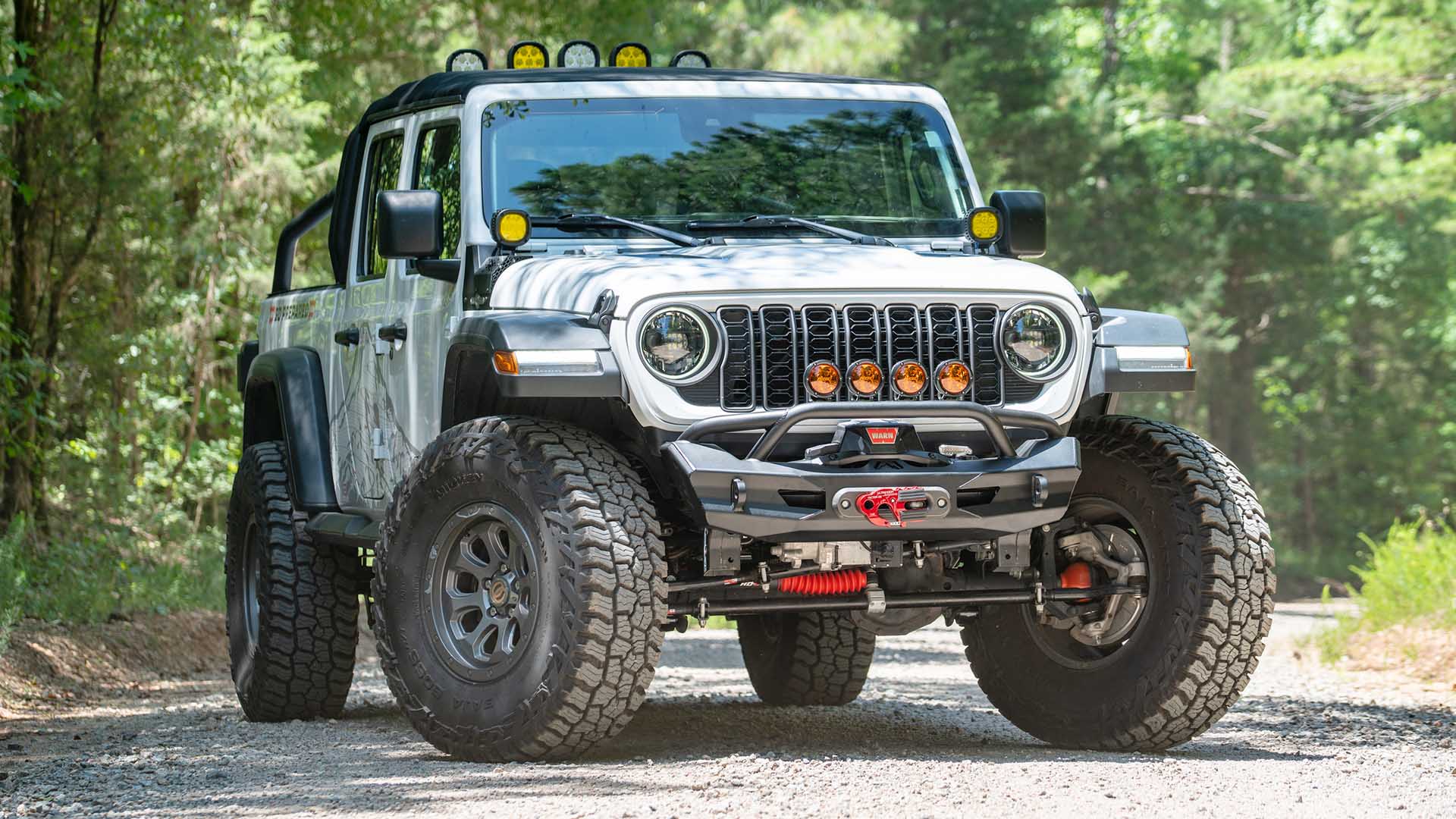 Fab Fours JL24-B5152-1 Ghost Stubby Front Winch Bumper w/ Guard for 2018–2025 Jeep Wrangler JL & 2020–2025 Gladiator JT eliteracefab.com