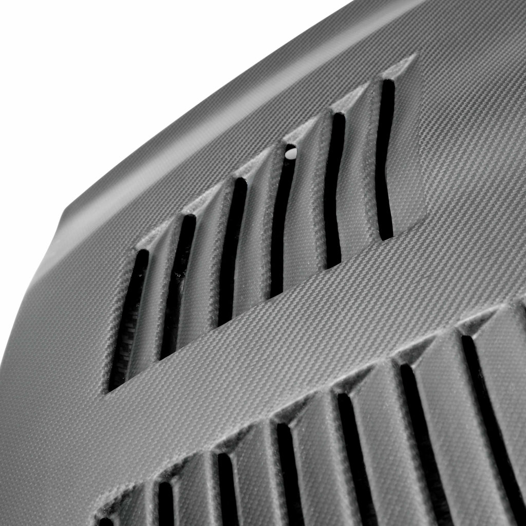 Detailed image of the dry carbon fiber texture on the Seibon GT hood, showcasing its high-performance craftsmanship.