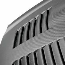 Load image into Gallery viewer, Detailed image of the dry carbon fiber texture on the Seibon GT hood, showcasing its high-performance craftsmanship.