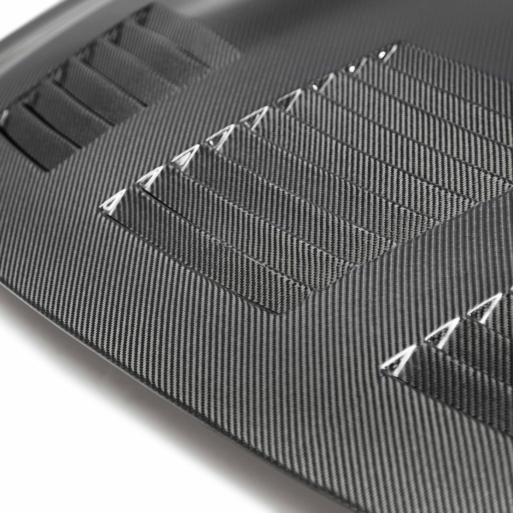 Close-up of the Seibon GT-Style Carbon Fiber Hood’s vented design, highlighting its performance-focused engineering and premium carbon fiber weave.