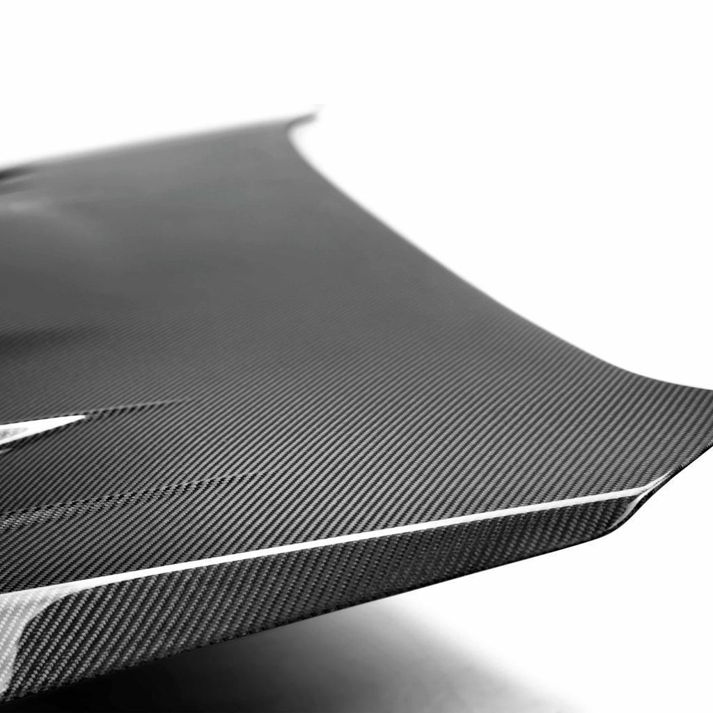 CW-Style Carbon Fiber Hood for 2015-2021 Subaru WRX/STi featuring aggressive design and glossy finish.