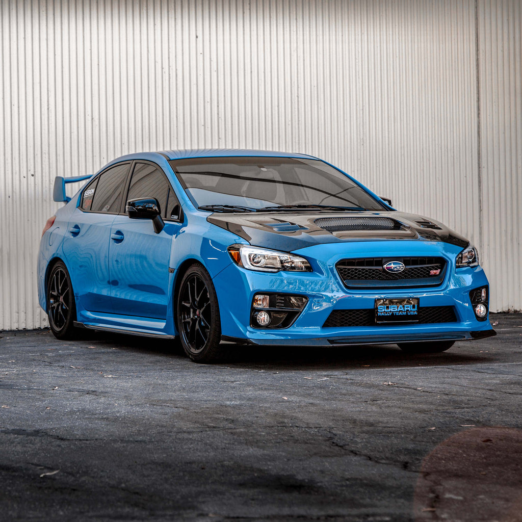 CW-Style Carbon Fiber Hood for 2015-2021 Subaru WRX/STi featuring aggressive design and glossy finish.