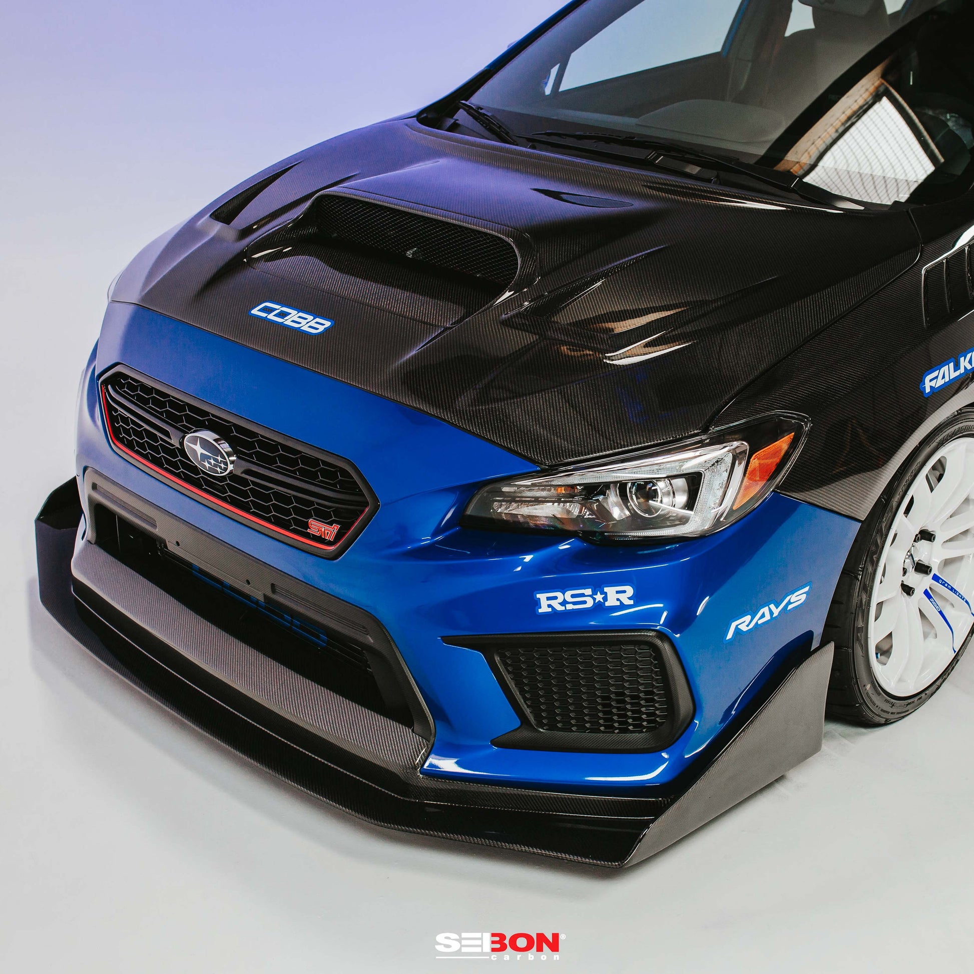 VS-Style Carbon Fiber Hood for 2015-2021 Subaru WRX/STi with aggressive vents and glossy finish.