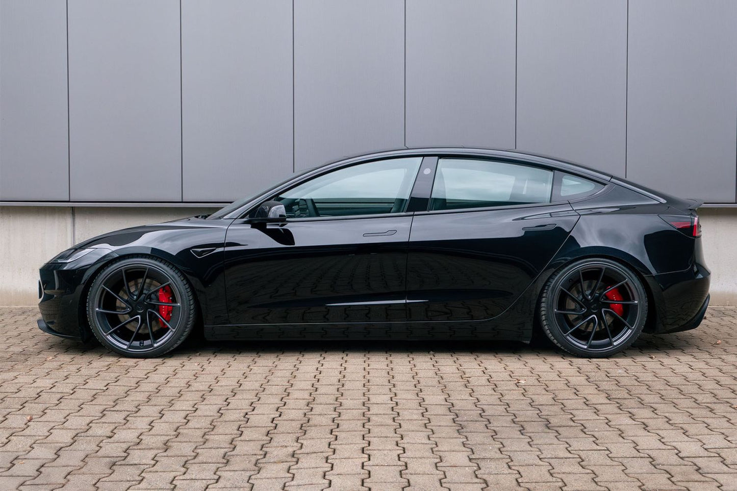 H&R 23038-1 VTF adjustable lowering springs installed on 2018-2026 Tesla Model 3 AWD