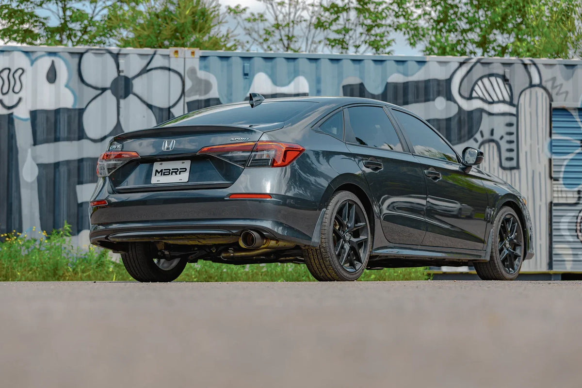 MBRP S4905AL 2.5-inch cat-back exhaust for 2022-2026 Honda Civic Sport sedan. Shown installed view of under the car and how to install and appearance of system.