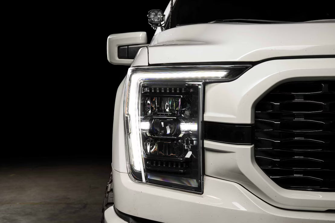 Morimoto XB Evo Hybrid headlights with white DRL running lights on installed on 2021-2023 Ford F-150