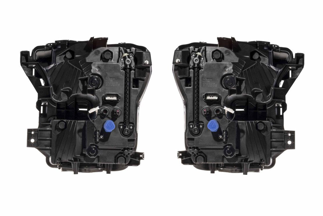 Rear view of Morimoto XB Evo LF2-502 headlights showing housings, wiring, connectors, and rear covers