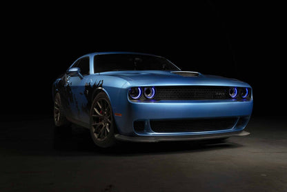 Morimoto XRGB LF495 headlights on Dodge Challenger with white DRLs illuminated at night