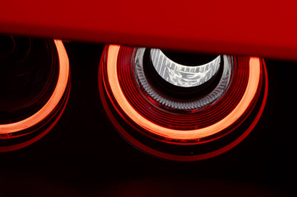 Morimoto XRGB LF495 RGB headlights installed on Dodge Challenger side-angle view