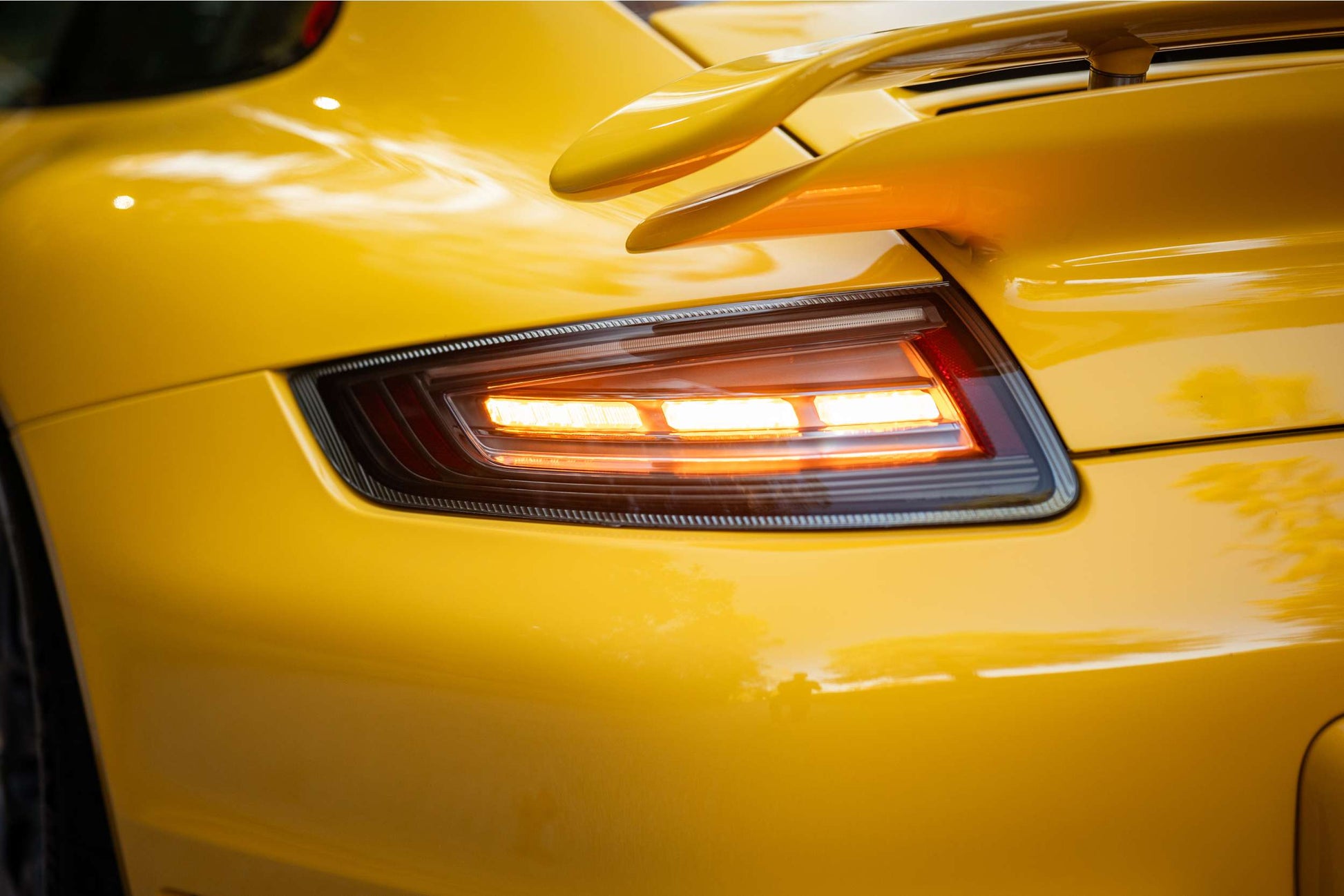 Morimoto LF745 smoked XB LED tail lights for 2005-2008 Porsche 911 997.1 installed with turn signal light