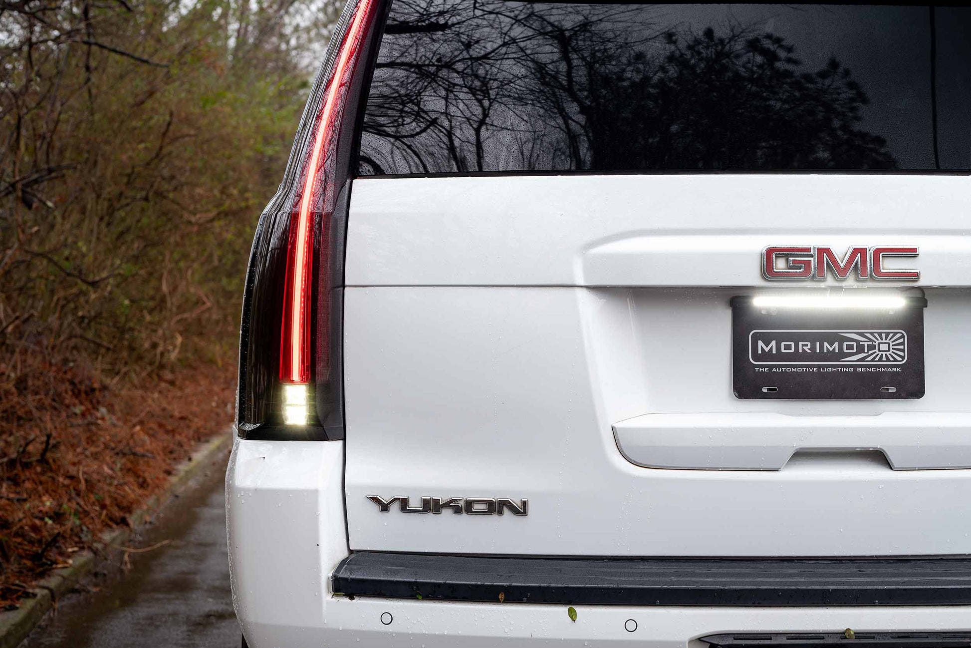 Morimoto LF766 smoked LED tail lights for 2015-2020 GMC Yukon with sequential turn signals image shows reverse lights