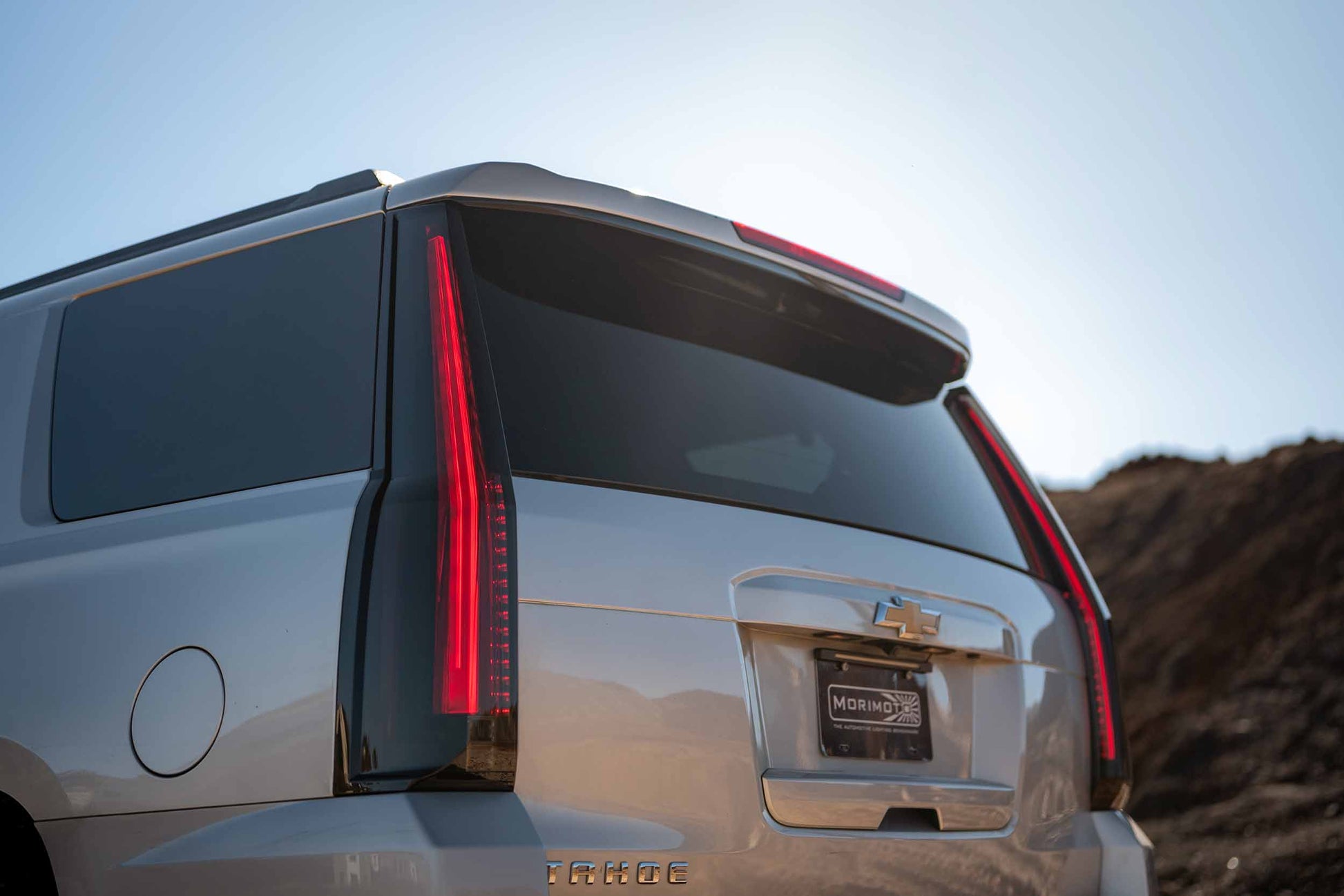 Morimoto LF767 smoked LED tail lights for 2015-2020 Chevrolet Tahoe and Suburban clean light red lights shown