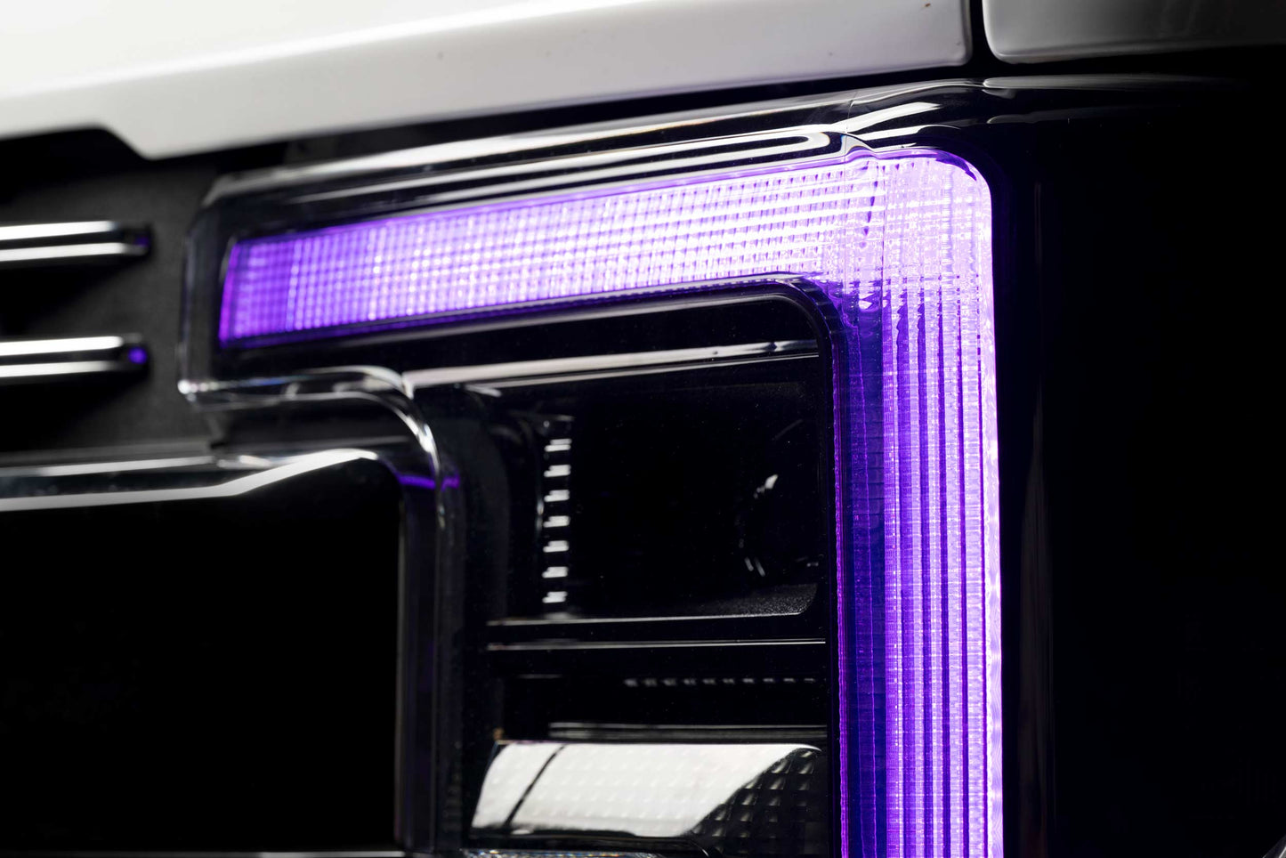 Morimoto LF777 XRGB LED headlights for 2017-2019 Ford Super Duty F250 F350 F450 with RGB DRL close up purple color headlights
