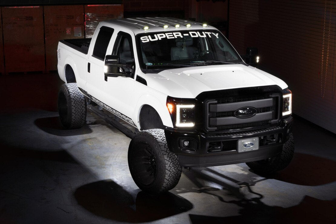Morimoto XRL05 V2 white LED rock light kit 4 piece universal for trucks jeeps SUVs installed on Ford F-250 Super Duty