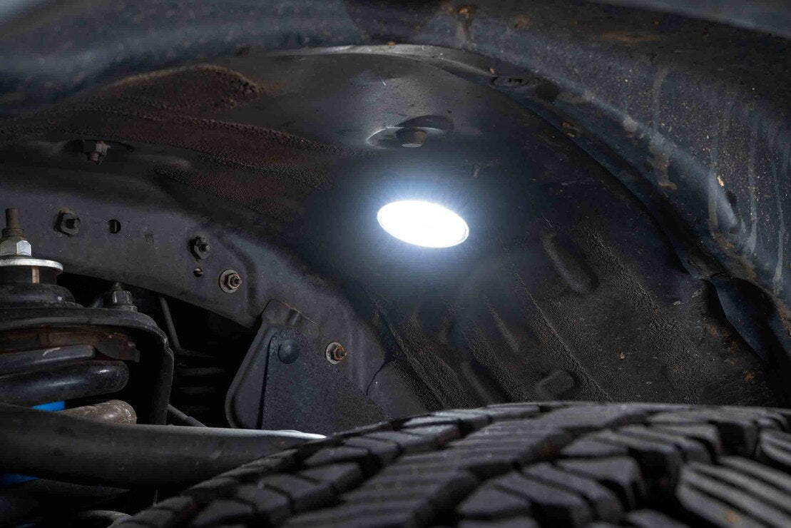 Morimoto XRL05 V2 white LED rock light kit 4 piece universal for trucks jeeps SUVs shown installed and inside the wheel well and where to mount this kit
