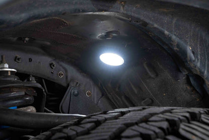 Morimoto XRL05 V2 white LED rock light kit 4 piece universal for trucks jeeps SUVs shown installed and inside the wheel well and where to mount this kit