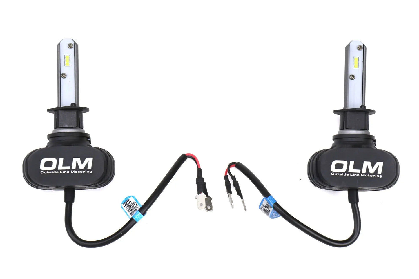 Two OLM LED light bulbs with connectors on a white background
