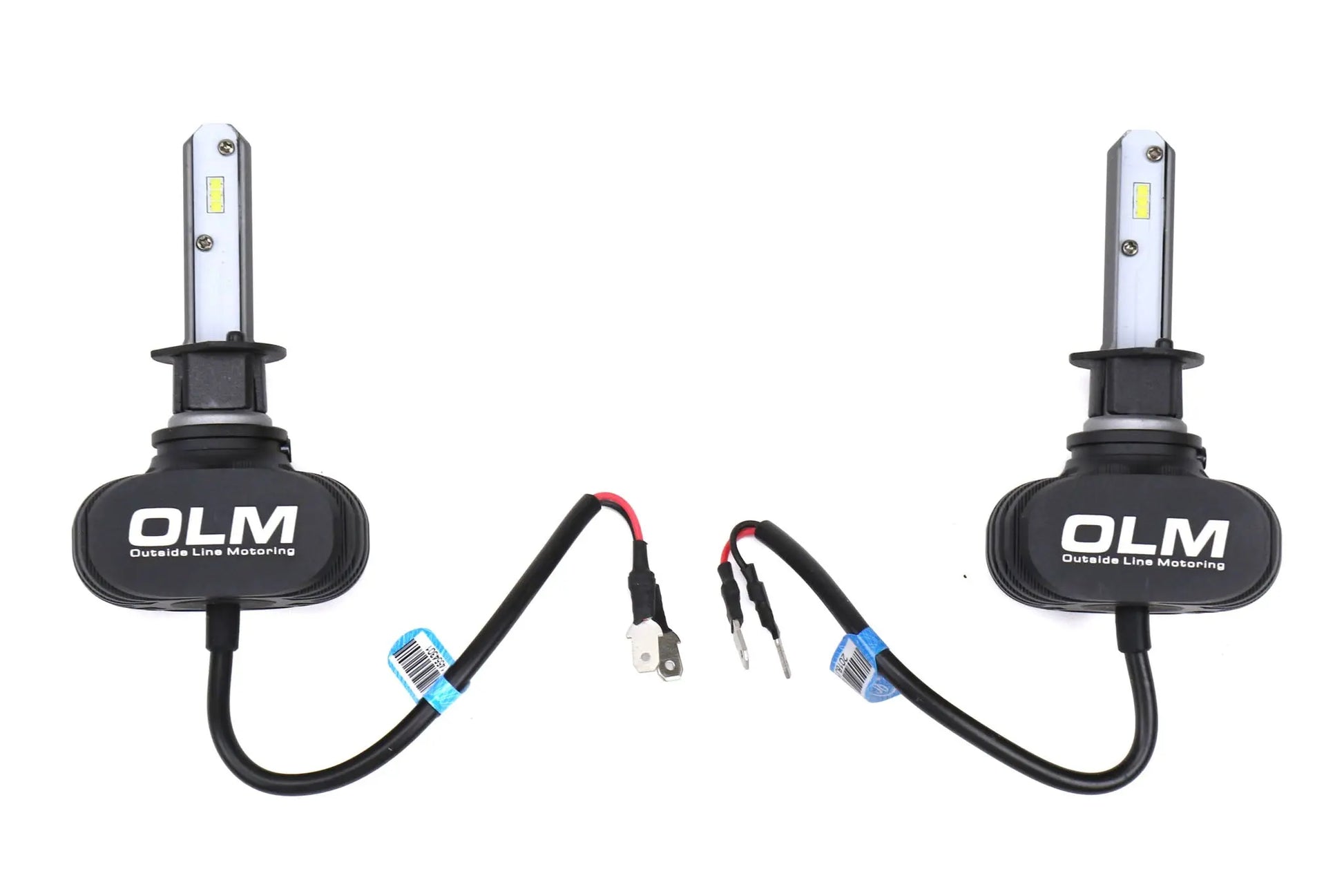 Two OLM LED light bulbs with connectors on a white background