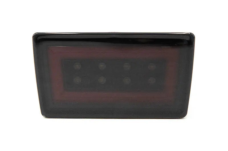 OLM F1 NB+R V2 smoke lens fog light with gloss black base and red bar for 2022-2026 Subaru WRX