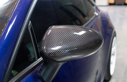 Revel GT dry carbon fiber mirror covers gloss finish for 2022-2026 Toyota GR86 and Subaru BRZ - 1TR4GT0CS09
