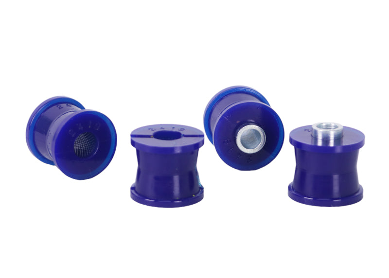 Complete SuperPro SPF2419K rear sway bar link bushing kit laid out with parts.