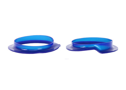 Full SuperPro SPF3247K rear spring insulator kit contents with polyurethane components.