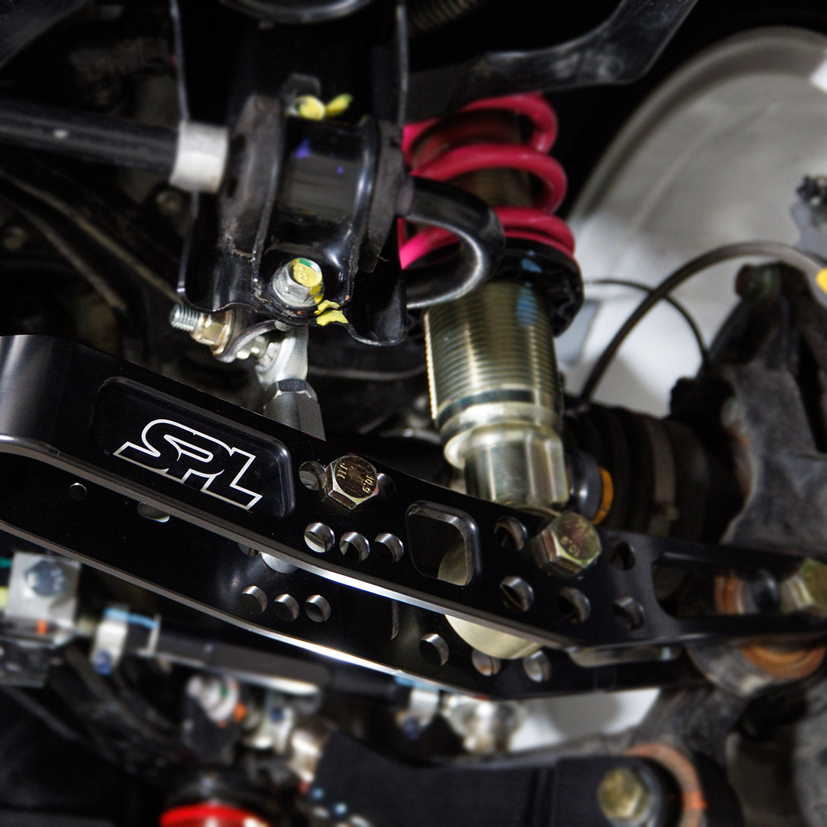 SPL RE FRS adjustable rear sway bar endlinks for GR86, BRZ, WRX, and FR-S, designed to eliminate preload, correct sway bar angle, and improve handling balance