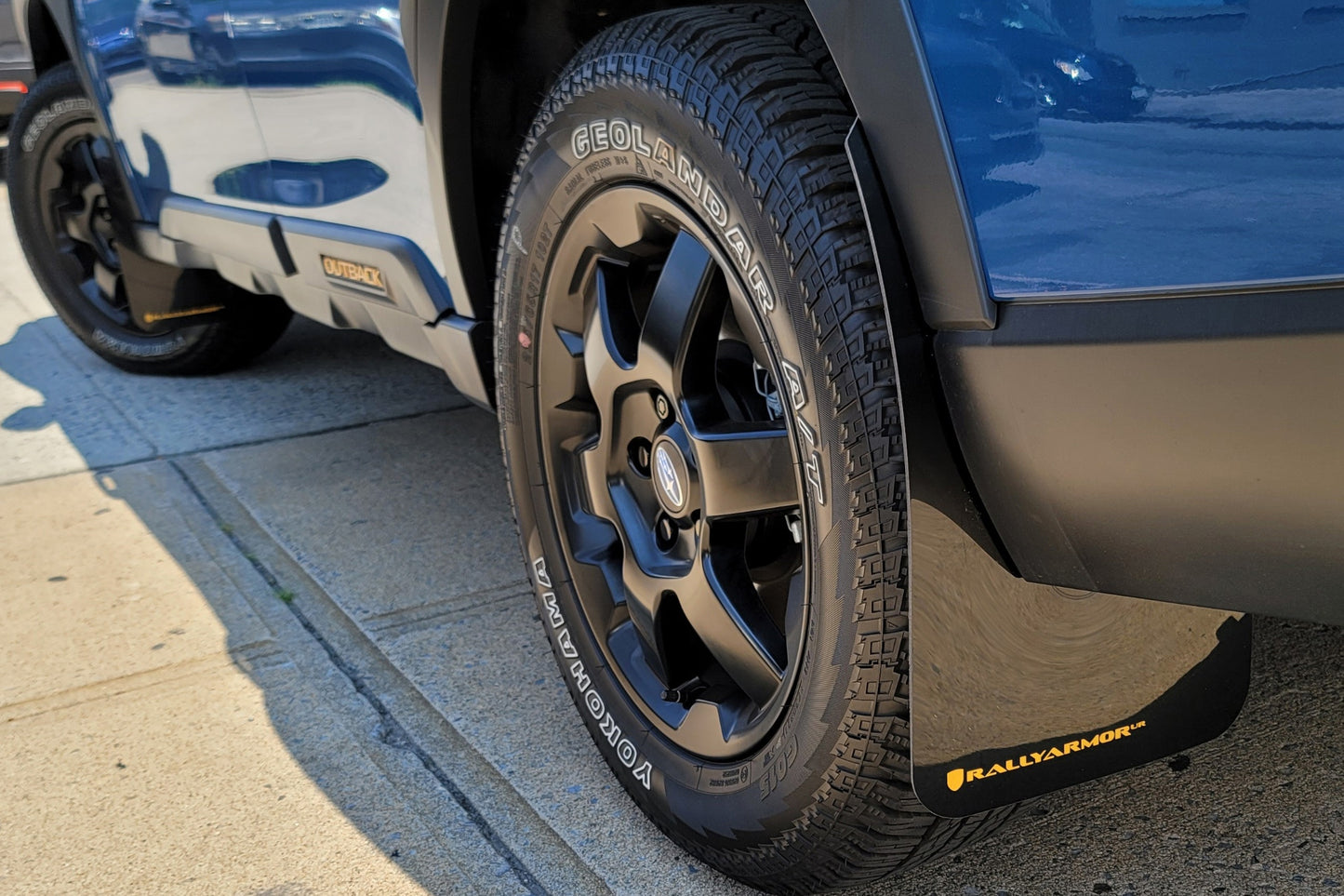 2022 Subaru Outback Wilderness with Rally Armor UR Mud Flaps – Wild Orange Logo – MF76-UR-BLK/WOR