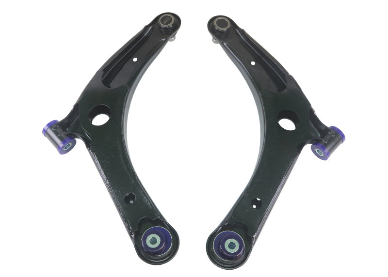 Close-up of SuperPro polyurethane caster-enhancing bushing on TRC1023 control arm.