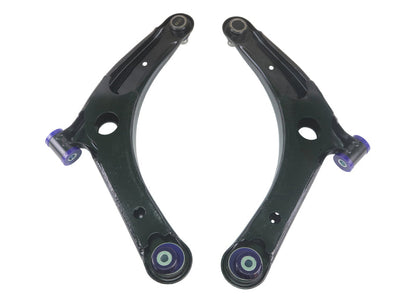Close-up of SuperPro polyurethane caster-enhancing bushing on TRC1023 control arm.